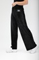 KENDALL + KYLIE-Γυναικείο αθλητικό παντελόνι KENDALL + KYLIE ACTIVE VELVET FLARE μαύρο